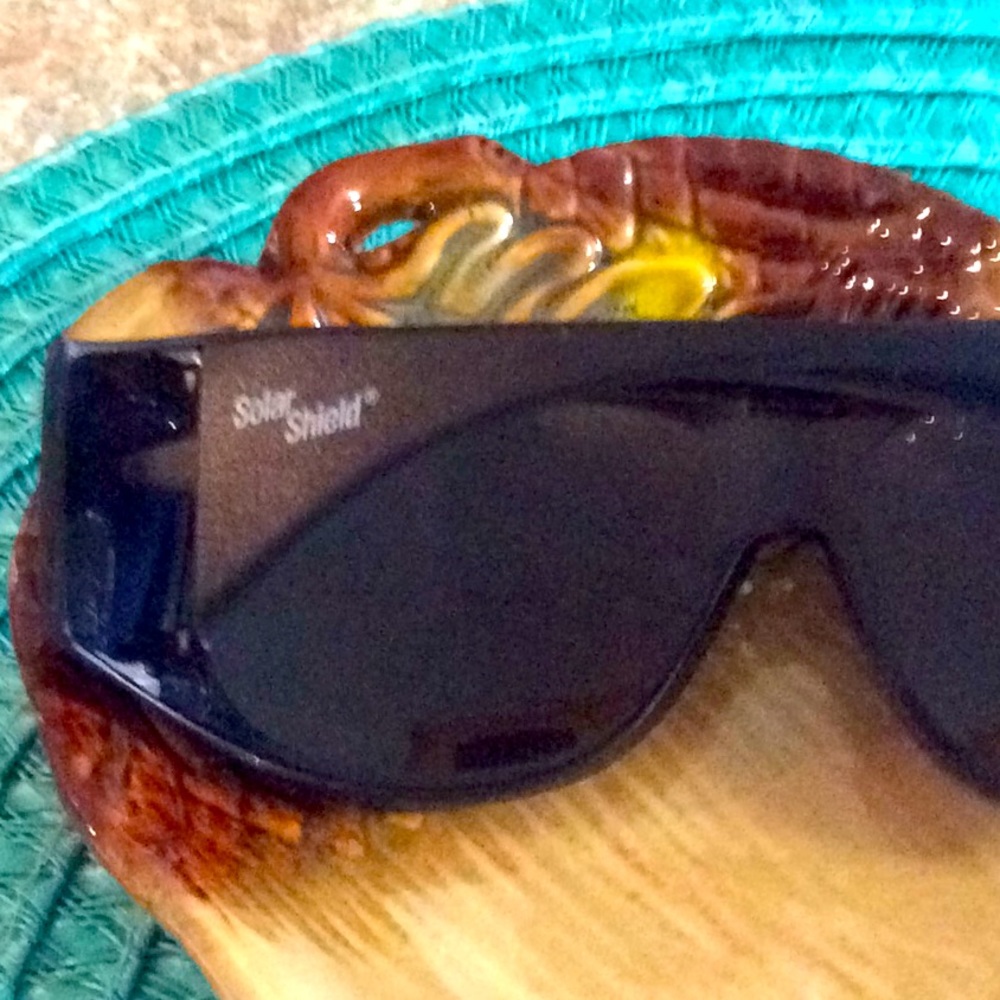 NWOT Solar Shield black Driving sunglasses tinted.